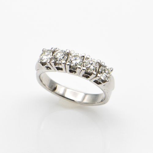 Front view of 18K white gold diamond wedding ring with five round-cut diamonds